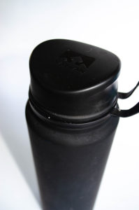 black reusable waterbottle, brand is Nathan