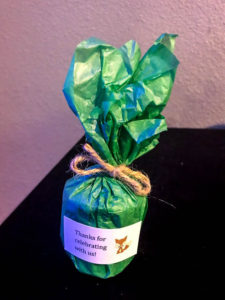 baby shower on a budget favors (tissue paper wrapped votive candle with thank you sticker and twine